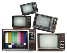 four old tvs with different color bars on the front and one is black, white, red, blue, green