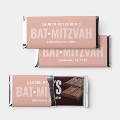 two bar wrappers with chocolate on them, one is for bat mitzvah and the other is for batman