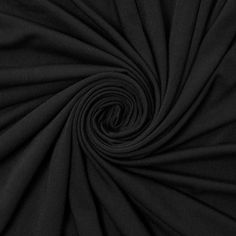 the black fabric is very large and has a circular design