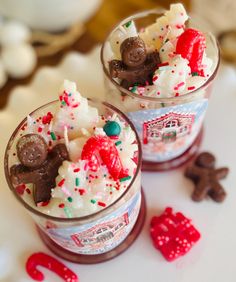 two glasses filled with ice cream and toppings