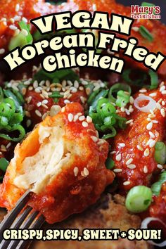 the cover of vegan korean fried chicken on a plate with a fork in it