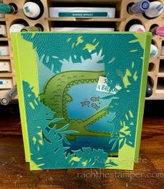 a card with an image of a dinosaur on it