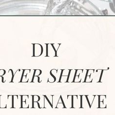 the words diy dryer sheet alternative written in black on a white background with silver dishes