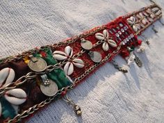 Belt decorated with coins and cowries Coin Belt Outfit, Navratri Belt Handmade, Afghani Jwellary, Ngepan Iban, Navratri Belt, Hand Embroidered Jewelry, Embroidery Belt, Navratri Collection, Saree With Belt