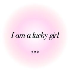 the words i am a lucky girl in black on a pink background