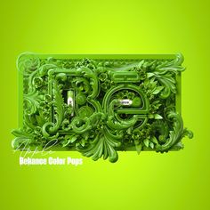 a green photo frame with an ornate design on the top and bottom, in front of a bright green background