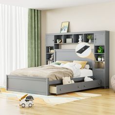 a child's bedroom with a bookcase bed and toy cars