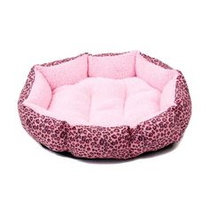 a pink leopard print dog bed on a white background