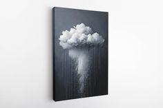 a black and white photo of a cloud with rain coming from it on a wall