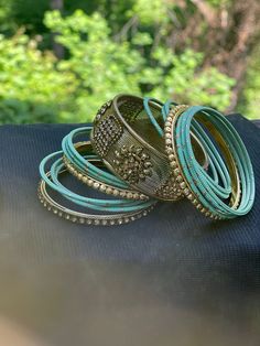 This set of 17 handmade metal bangles is the perfect addition to any boho or hippie outfit. Crafted with copper these lightweight bangles are 2.2 in size and a great accessory to add a splash of style and color.  Features: - Set of 17 metal bangles - Handmade items - Style: Boho and hippie - Material: Copper - Size: 2.2 Blue Bangles, Jaipur Jewelry, Metal Bangles, Handmade Bangles, Unique Bracelets, Hippie Outfits, Oxidized Silver, Style Boho, Silver Blue