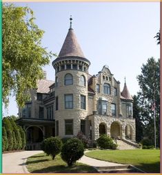 an old castle like house with a turret