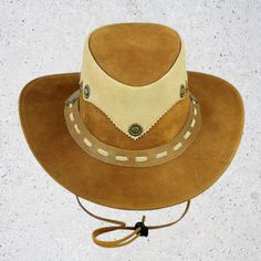 Leather Cowboy Vintage Style Hat | Cowboy Vintage Hat For those who want a simpler design, Selecto Hats offers the streamlined Tan Colored - Leather Cowboy Hat. leather from tanned cowhide,  The large brim of this hat flares upward at the sides, and it has a short, tapering crown with a slim self-leather hat band. Made by hand from 100 percent leather, Stylish & Strong. Fast Delivery, Superior Quality Assurance of Contentment Brown Leather Fedora Hat, Brown Leather Hat Band With Sweatband, Brown Leather Hat With Short Brim, Brown Leather Wide Brim Hat, Beige Leather Flat Brim Hat, Brown Rodeo Hat With Leather Patch, Brown Leather Hats For Western-themed Events, Brown Leather Hat For Rodeo, Brown Leather Rodeo Hat