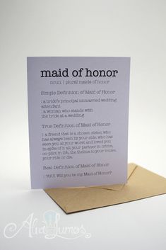 a card with the words maid of honor written in black ink on top of it