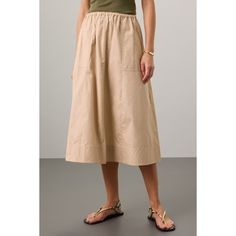 Beige cotton (100% Cotton). Skirt. Pull-on closure. 31.5" from shoulder to hemline. Imported. Relaxed Cargo Skirt With Elastic Waistband For Summer, Cotton Skirt With Pockets For Daywear, Summer Cargo Skirt With Elastic Waistband And Relaxed Fit, Chic Midi Cargo Skirt For Spring, Spring Chic Midi Cargo Skirt, Chic Spring Midi Cargo Skirt, Summer Cargo Skirt With Elastic Waistband, Cotton Midi-length Workwear Bottoms, Cotton Midi-length Bottoms For Work