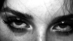 black and white photograph of a woman's eyes