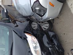 two cars that have been involved in an accident