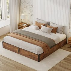 a large bed sitting on top of a wooden floor