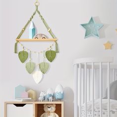 a baby's room with a crib and toys on the shelf next to it