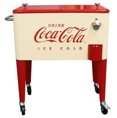 an old fashioned coca cola cooler with wheels