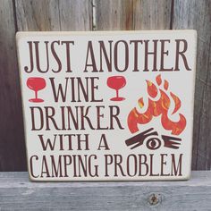 a sign that says just another wine drinker with a camping problem