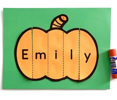 a piece of paper cut out to look like a pumpkin with the word family on it