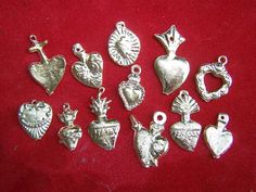 Lot of 50 ALL HEARTS milagros of standard size with small holes on the top. Made of brass. Great variety: you will receive multiples of what is shown and maybe some additional hearts not shown (depending on what I get in). Imported from Mexico. Heart Pendants, All Heart, Luck Charms, Arts And Crafts Supplies, Metal Charm, Beading Supplies, Golden Color, Sacred Heart, Silver Heart