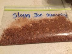 a bag of sloppy joe seasoning sitting on top of a counter next to a knife