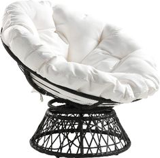 an egg chair with white cushions and black metal frame, in front of a white background