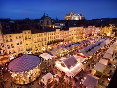 an aerial view of a christmas market in france