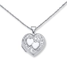 This darling heart-shaped locket necklace for her is decorated with two hearts and a scrollwork design. The sterling silver pendant sways from an 18-inch cable chain that fastens with a spring ring clasp. Sterling Silver Locket Necklace, Heart Locket Necklace, Heart Shaped Jewelry, Ashes Jewelry, Necklace For Her, White Necklace, Two Hearts, Heart Locket, Accessories Jewelry Necklace