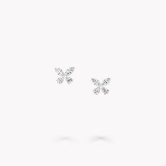 Crafted to bring a touch of brilliance to your every day, this pair of Classic Butterfly petite diamond stud earrings in white gold are set with pear shape and marquise stones. Beautifully embodying transformation, jewels from the Butterfly collection are precious talismans reminding the wearer of their strength, freedom and opportunity to fly. A dainty pair of Classic Butterfly diamond small stud earrings with a total approximate weight of 0.43 carats. Graff Butterfly, Butterfly Diamond Ring, Diamond Shaped Engagement Ring, Graff Diamonds, Diamond Drop Pendant, Diamond Drop Necklace, Mini Bracelet, Butterfly Collection, Engagement Ring Shapes