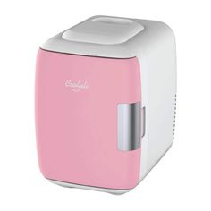 a pink and white toaster sitting on top of a counter