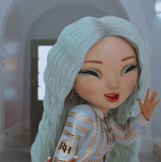 a close up of a doll with green hair and blue eyes holding her hand out