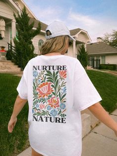 ✺ NURTURE NATURE - WILDFLOWER GRAPHIC TEE ✺ * Q U I C K F A C T S * This design is a unique, one-of-a-kind awesome illustration that has been created in house. ✺ 100% Cotton (fiber content may vary for different colors) ✺ Classic fit ✺ Sizing is unisex so runs like men's, though not overly large ✺ Most women find their typical size works best, since they are meant to fit a touch loose This is a Unisex T-Shirt which you can use as an Oversize T-Shirt Dress, please check the dimensions to make sur Mother Nature Tshirt, Graphic Tee Photography, Spring Tops With White Screen Print, White Print Screen Printed Tops For Spring, Spring White Print Screen Printed Tops, White Printed Screen Print Tops For Spring, Spring White Print Screen-printed Tops, Spring White Printed Top, Spring White Print Graphic Tee Shirt