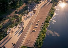 an aerial view of people walking on a boardwalk