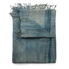 two pieces of denim with fraying on the bottom and one piece folded over it