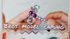 two hands holding beads with the words bros model capping