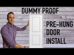 a man standing in front of a door with the words dummy proof pre - hung door install