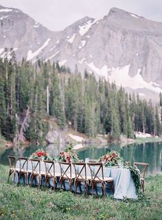 an instagram page with a photo of a table set up for a wedding in the mountains