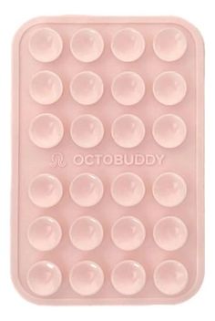 an image of a pink tray with lots of bubbles on the bottom and one in the middle