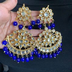 Beautiful Premium Quality Ac Kundan Jhumka Chandbali With Real Beads And Meenakari Works Heavy Patterns Blue Chandbali Jewelry With Cutdana Detail, Blue Chandbali Jewelry With Cutdana, Blue Cutdana Chandbali Jewelry, Festive Blue Tilla Jhumkas, Blue Cutdana Earrings For Wedding, Blue Cutdana Wedding Earrings, Blue Dangle Danglers For Wedding, Blue Jhumkas For Festivals And Celebrations, Blue Latkan Danglers For Wedding