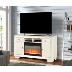 a tv stand with a fireplace in it