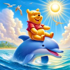 winnie the pooh riding on top of a dolphin