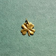 This charm is the perfect size for a necklace at ~0.5" in size.The charm is made of raw brass and comes with a jump ring for threading on your favorite necklace or jewelry making. Brass Pins, Ring With Charms, Four Leaf Clover Charm, 4 Leaf Clover Necklace, Necklace Charms, Four Leaf Clover Necklace, Clover Charm, Four Leaves