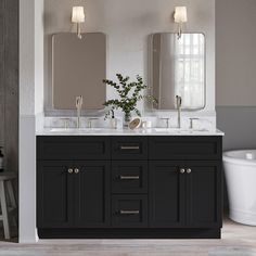 a bathroom with two sinks and mirrors on the wall