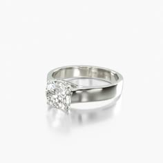 a white gold ring with a single diamond