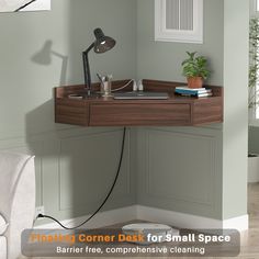 a corner desk with a lamp on it