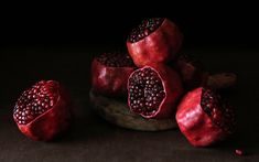 some pomegranates are sitting on a table