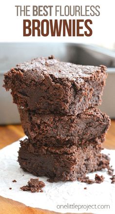 chocolate brownies stacked on top of each other with text overlay that reads the best flourless brownies