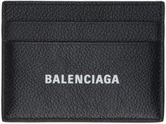 Grained calfskin card holder in black. · Logo printed at face · Four card slots · Central note slot · Buffed calfskin lining · H3 x W4 in Supplier color: Black/White White Balenciaga, Balenciaga Black, Balenciaga Mens, Logo Stamp, Credit Card Holder, Card Holder Leather, Black Logo, Black Print, Card Slots